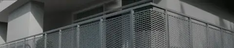 Expanded metal mesh parapets