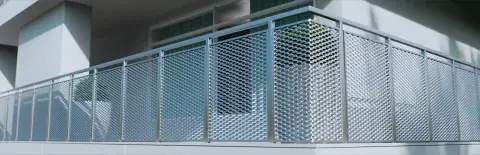 Expanded metal panels for parapets